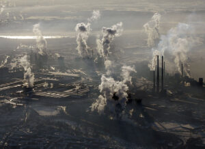 FILE - In this Jan. 9, 2009 file photo is an aerial view of the steel company ThyssenKrupp in Duisburg, western Germany. Inger Andersen, head of the U.N. Environment Program, says the world needs 'quick wins to reduce emissions as much as possible in 2020.' Ahead of a global climate summit in Madrid next week, her agency published a report Tuesday showing the amount of planet-heating gases released into the atmosphere hitting a new high last year.(AP Photo/Frank Augstein,file)