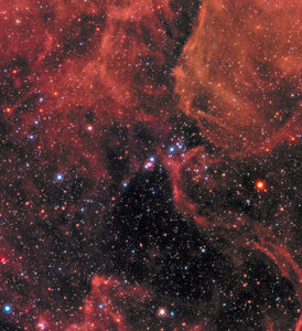 This new image of the supernova remnant SN 1987A was taken by the NASA/ESA Hubble Space Telescope in January 2017 using its Wide Field Camera 3 (WFC3). Since its launch in 1990 Hubble has observed the expanding dust cloud of SN 1987A several times and this way helped astronomers to create a better understanding of these cosmic explosions. Supernova 1987A is located in the centre of the image amidst a backdrop of stars. The bright ring around the central region of the exploded star is composed of material ejected by the star about 20 000 years before the actual explosion took place. The supernova is surrounded by gaseous clouds. The clouds’ red colour represents the glow of hydrogen gas. The colours of the foreground and background stars were added from observations taken by Hubble’s Wide Field Planetary Camera 2 (WFPC2).